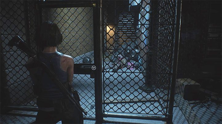 Kehren Sie zu dem Tor zurück, an dem Sie zuvor vorbeigekommen sind - es befindet sich links vom Waffenladen - Resident Evil 3: Downtown - Walkthrough zum dritten Besuch - Walkthrough zu Story - Resident Evil 3 Guide