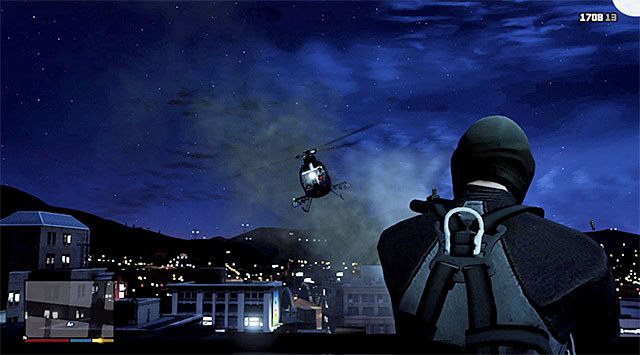 Nachdem Sie den Außenbalkon erreicht haben, gehen Sie zu Michael und verwenden Sie die Fähigkeit zur Zeitverlangsamung, um den im obigen Screenshot gezeigten Piloten des Hubschraubers zu eliminieren - GTA 5: Der Bureau Raid, Variante Roof Entry - Mission Walkthrough - Hauptmissionen - GTA 5 Guide