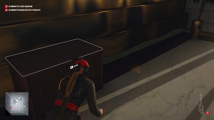 Once he's not paying attention to you, sneak up to the container on the left and hide inside - Hitman 3: Marcus Stuyvesant - how to kill him? Dubai, walkthrough - On Top of the World - Dubai - Hitman 3 Guide