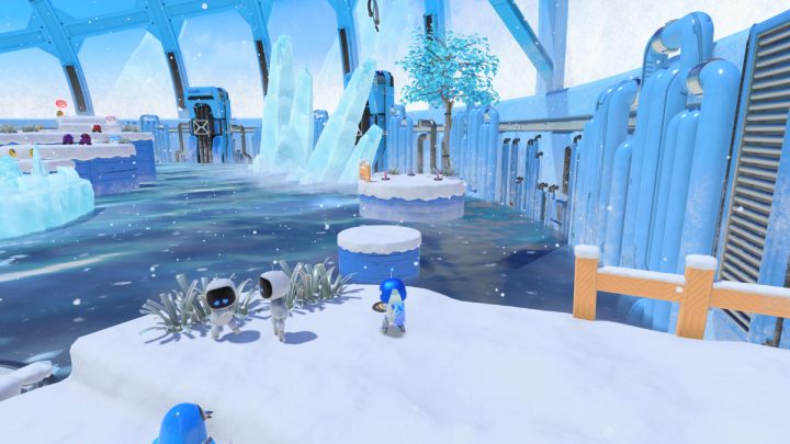 Ziehen Sie die Drähte wieder in den Schnee und werfen Sie das Element auf das blaue Objekt, das über Wasser hängt - Astros Playroom: Frigid Floes - Komplettlösung - Kühlquellen - Astros Playroom Guide