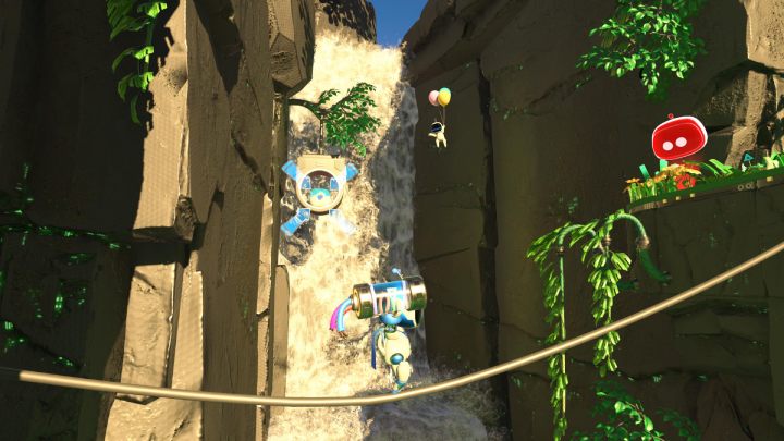 Bevor Sie auf die andere Seite gehen, schießen Sie den Münzbehälter und den am Wasserfall schwimmenden Bot ab - Astros Playroom: Renderforest - Komplettlösung - GPU Jungle - Astros Playroom Guide