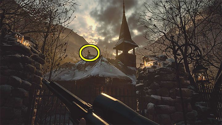 2/20 The goat is on the roof of the church adjacent to the cemetery - Resident Evil Village: Goats of Warding - descriptions, full list - Secrets & Collectibles - Resident Evil Village Guide