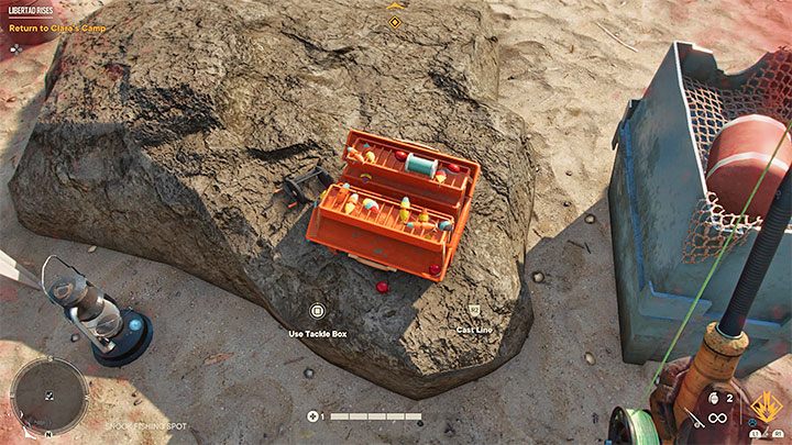 Bevor Sie mit dem Angeln beginnen, finden Sie in der Nähe des Angelplatzes eine Kiste, in der Sie die richtige Ausrüstung für eine bestimmte Fischart auswählen können - Sie müssen Ihre Angelrute anpassen - Far Cry 6: Jagen und Angeln - Grundlagen - Far Cry 6 Anleitung