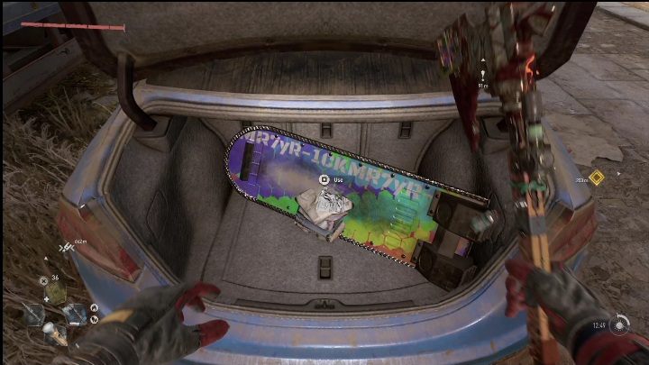 Schließlich erreichen Sie das blaue Auto, dessen Kofferraum Sie öffnen können – Dying Light 2: Hoverboard (Easter Egg) – wo zu finden?  - Finder & Geheimnisse - Leitfaden für Dying Light 2