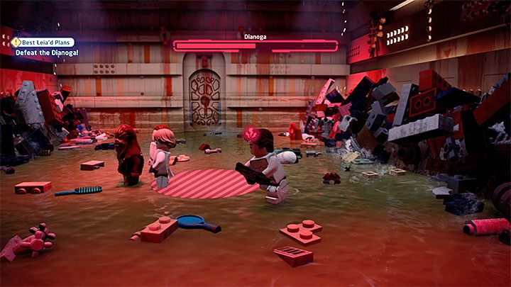 In der zweiten Phase des Duells musst du den roten Kreisen auf dem Boden ausweichen, die noch mehr Versuche symbolisieren, den Helden zu fangen - LEGO Skywalker Saga: Dianoga - Boss, wie zu besiegen?  - Chefs - LEGO Skywalker Saga Guide
