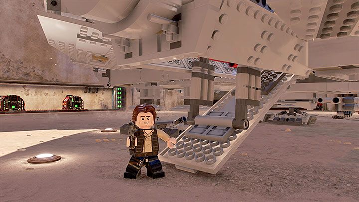 Nachdem Sie die Feinde auf der oberen Ebene beseitigt haben, kehren Sie zur unteren Ebene zurück - LEGO Skywalker Saga: Hunk of Junk - Walkthrough - Episode 4 - A New Hope - LEGO Skywalker Saga Guide