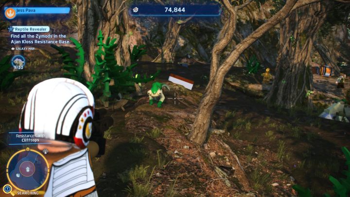 Es gibt ein weiteres grünes Chamäleon bei den Bäumen auf der Klippe – LEGO Skywalker Saga: Reptile Revealer – Komplettlösung – Herausforderungen – LEGO Skywalker Saga Guide