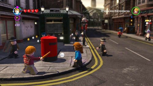 An der Kreuzung befindet sich ein roter Briefkasten, schießen Sie darauf und ein Schüler springt heraus - Harry Potter Jahre 5-7: Schüler in Gefahr, Teil 1 - Andere Sammlerstücke - LEGO Harry Potter Jahre 5-7 Leitfaden