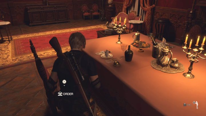 Wir haben Leons Stuhl oben abgebildet – dieser Sitz ist ein bisschen näher an den Gemälden – Resident Evil 4 Remake: Rätsel der Stühle im Speisesaal (Kapitel 9) – Rätsellösungen – Resident Evil 4 Remake Guide