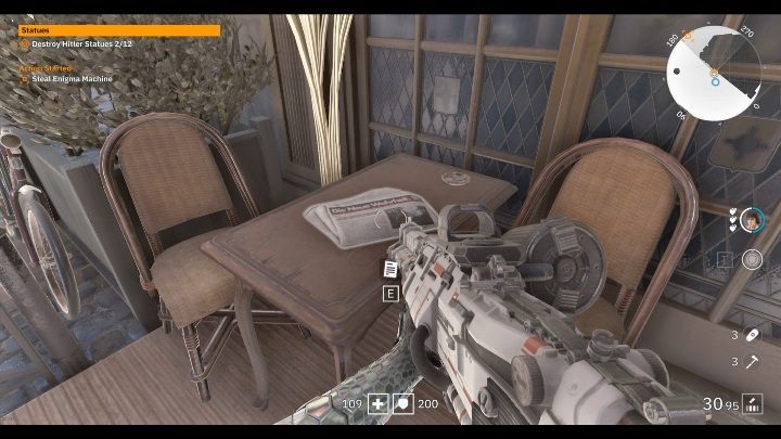 Sie finden die Zeitung auf dem Balkon eines weißen Gebäudes auf einem der Tische – Geheimnisse und Sammlerstücke in Little Berlin |  Wolfenstein Youngblood – Sammlerstücke und Geheimnisse – Wolfenstein Youngblood Guide