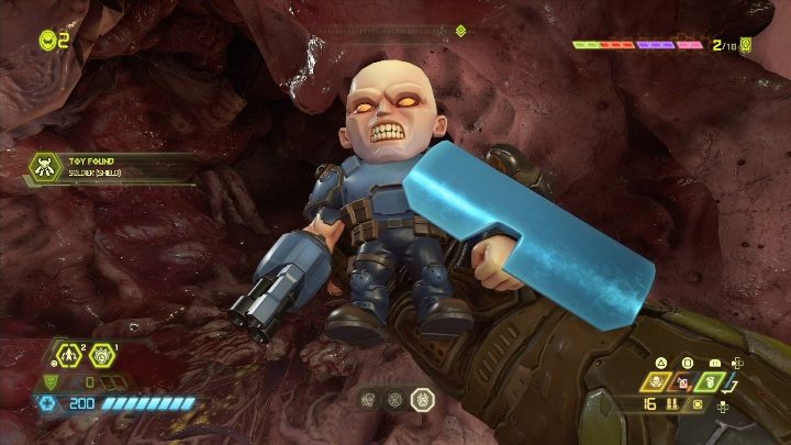 In the middle of the fleshy object you will find a figurine - Doom Eternal: Super Gore Nest secrets maps and location - Collectibles and secrets - Doom Eternal Guide