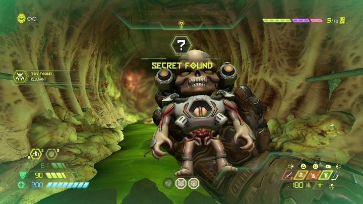 The next figurine is found in a small hallway next to a poisonous waterfall - Doom Eternal: Super Gore Nest secrets maps and location - Collectibles and secrets - Doom Eternal Guide