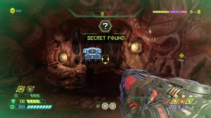 Travelling right from the checkpoint, youll reach a narrow corridor - Doom Eternal: Super Gore Nest secrets maps and location - Collectibles and secrets - Doom Eternal Guide
