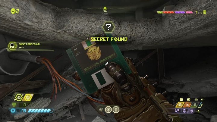 You will find a floppy disk with the cheat code in a hole in the floor - Doom Eternal: Arc Complex secrets maps and location - Collectibles and secrets - Doom Eternal Guide