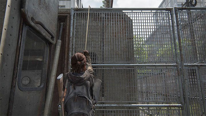 Sie müssen das Hängekabel verwenden, um auf das Dach des Mobile Command Center zu klettern – The Last of Us 2: The Gate – Sammlerstücke, Artefakte, Münzen – Seattle Tag 1 – Ellie – The Last of Us 2 Guide