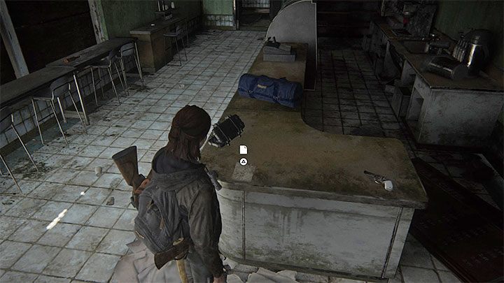 You can find the document on the counter of the cafe - The Last of Us 2: Downtown map - collectibles, artefacts, coins - Seattle Day 1 - Ellie - The Last of Us 2 Guide