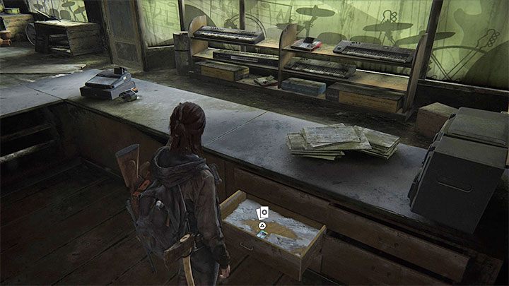 After entering the store, go to the main counter and open one of the drawers - The Last of Us 2: Downtown map - collectibles, artefacts, coins - Seattle Day 1 - Ellie - The Last of Us 2 Guide