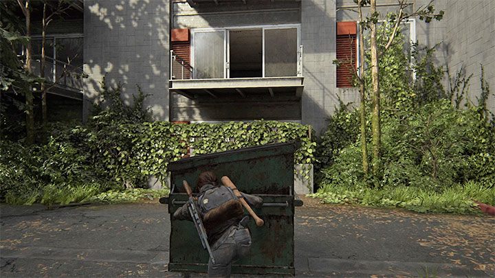 There is an apartment building at the rear of the motel and your job is to get to the balcony located on the first floor - The Last of Us 2: Capitol Hill - collectibles, artefacts, coins - Seattle Day 1 - Ellie - The Last of Us 2 Guide