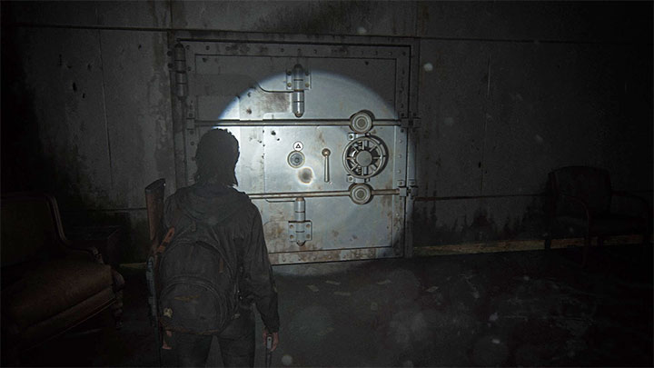 Ein verschlossener Eingang zum Tresor befindet sich in einem Raum auf der Rückseite der Bank – The Last of Us 2: Safe-Kombinationen – Seattle, Tag 1 Ellie – Safes – The Last of Us 2 Guide