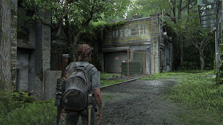 Biegen Sie links ab und erkunden Sie den Bereich hinter den Gebäuden auf der linken Seite – The Last of Us 2: Sichere Kombinationen – Seattle, Tag 2 Ellie – Safes – The Last of Us 2 Guide