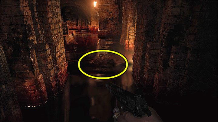 While exploring the partially flooded basement and Distillery, watch out for monsters hiding in the water - Resident Evil Village: Castles Courtyard - walkthrough - Dimitrescu Castle - Resident Evil Village Guide