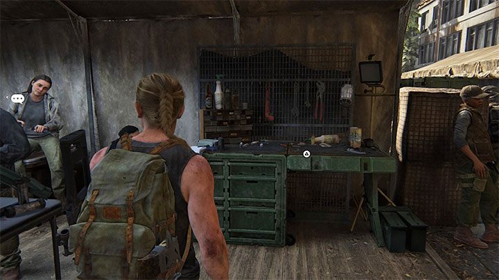 Die Forward-Basisstufe Die Workbench befindet sich in einem Gebiet mit einer großen Anzahl von NPCs - The Last of Us 2: Upgrades für Workbenches und Waffen - Charakterentwicklung und Ausrüstungs-Upgrades - The Last of Us 2-Handbuch