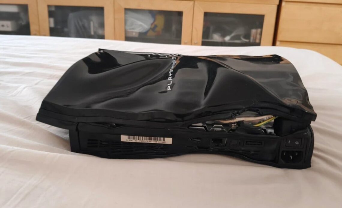 PlayStation fan wanted to save his PS3 console after the yellow death light appeared: he wrapped it in a towel, dried it with a hair dryer and completely deformed it, image source: u/seascouuut; Reddit.