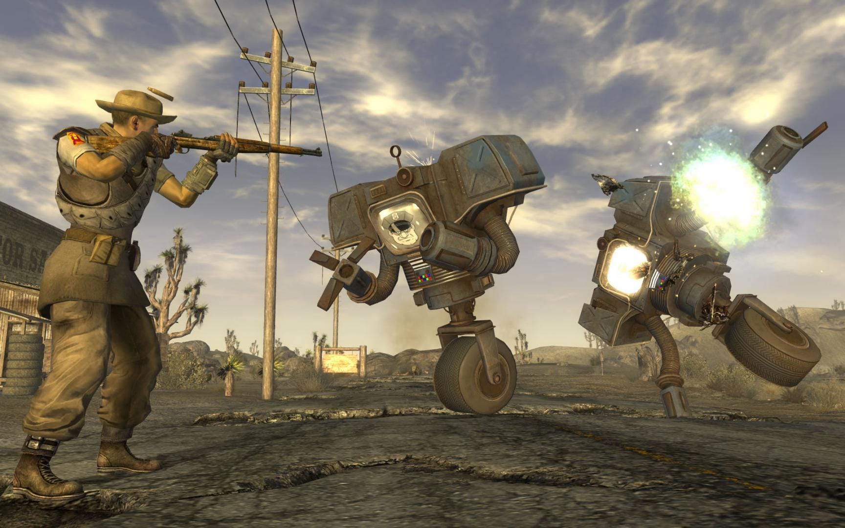 Der Kurier kämpft in einem Screenshot aus Fallout: New Vegas gegen ein paar Protect-o-trons