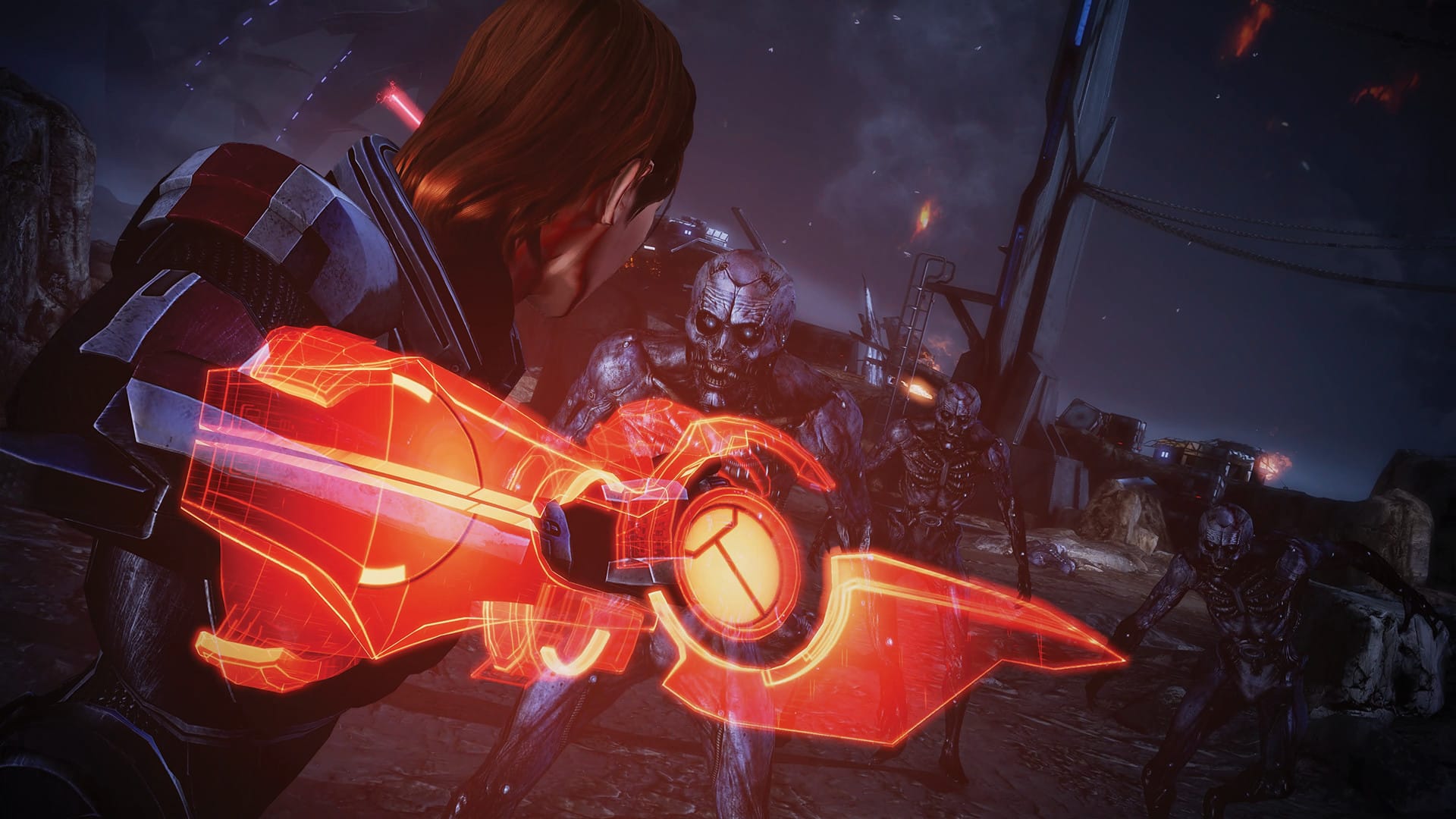In einem Screenshot aus Mass Effect 3 bekämpft Shepard eine Armee von Husks mit einer harten Lichtklinge, die an ihrer Rüstung befestigt ist.
